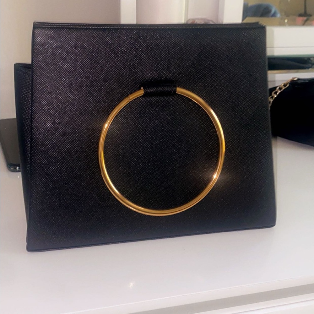 Elegant Black Handbag with Gold Accent